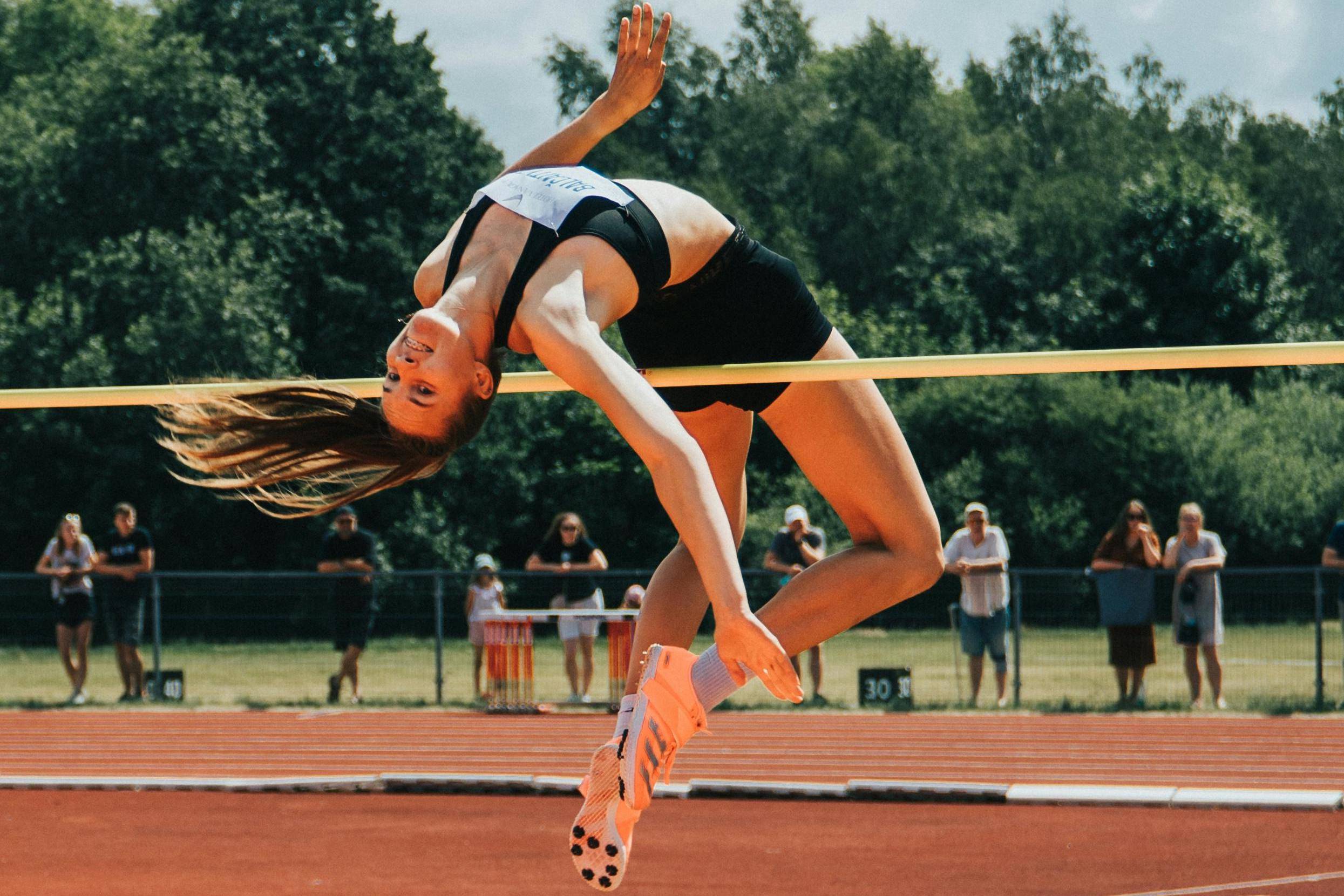 Cheerleader flying her inner bar